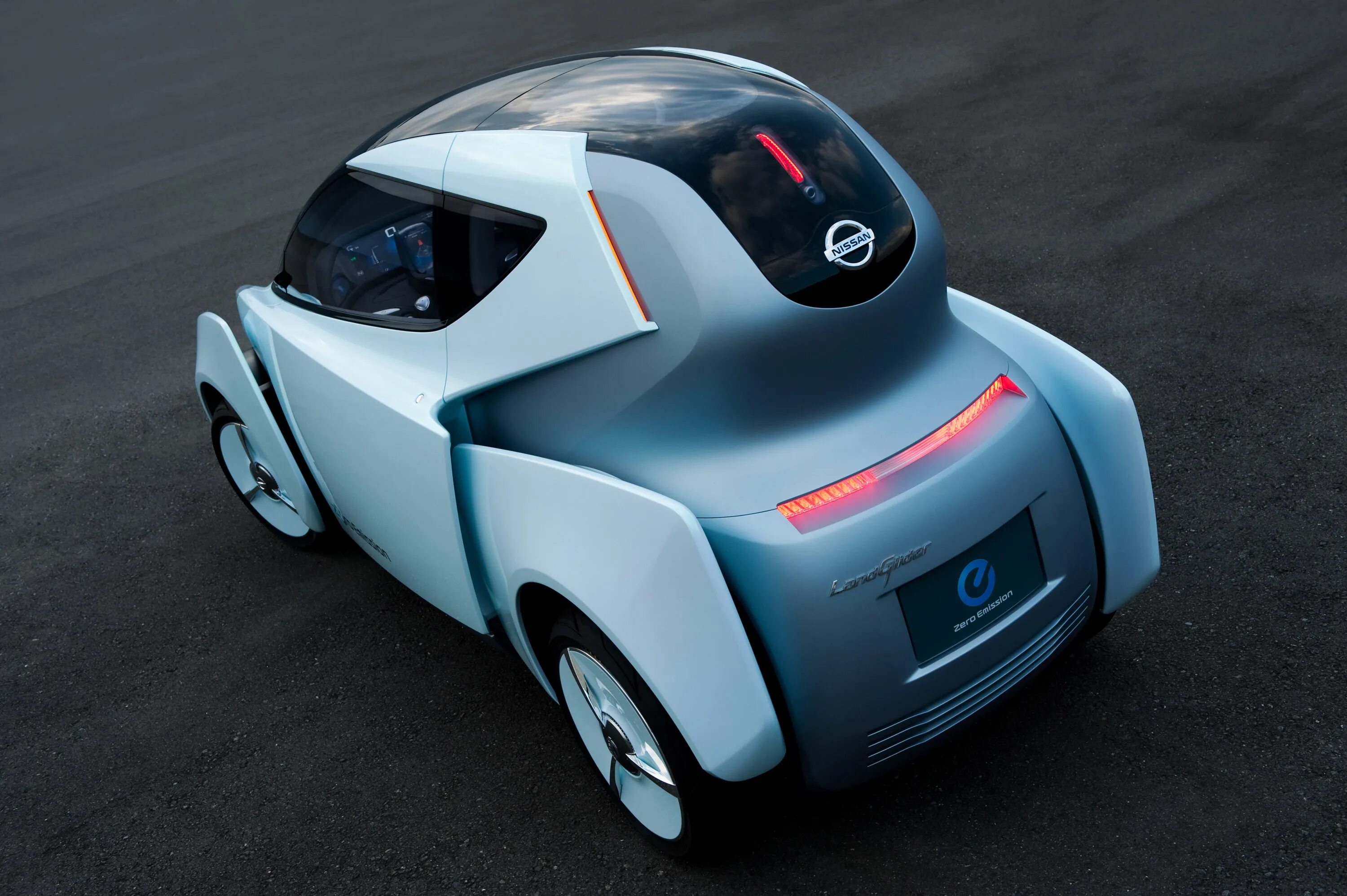 1 электронной автомобилей. Nissan Land Glider. Nissan Concept 2009. Nissan электромобиль концепт. Nissan электрокар концепт.