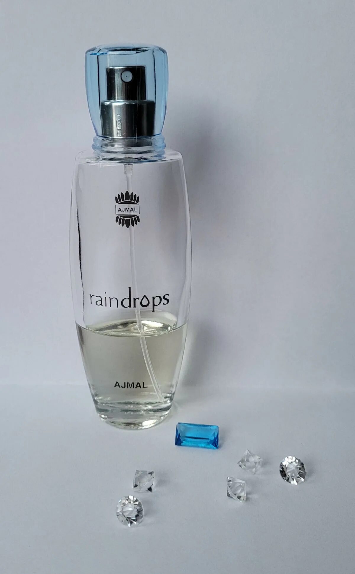 Raindrops отзывы. Парфюмерная вода Ajmal Raindrops. Ajmal Raindrops набор. Ajmal woman Raindrops туалетные духи 50 мл.. Аджмал Рейндропс фото.