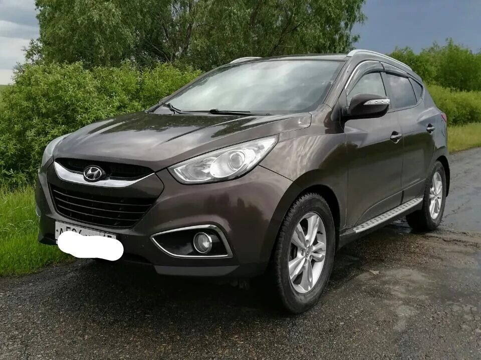 Ix35 2012 года. Hyundai ix35 2012. Hyundai ix35 2008. Hyundai ix35 2012 коричневый. Хендай ix35 2008.