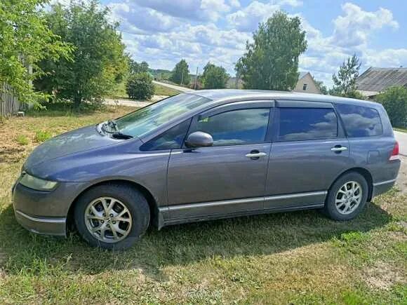 Honda odyssey ra6 ra7. Honda odyssey (3g). Хонда одиссей 2006. Хонда одиссей 2004. Хонда одиссей 2001 год.