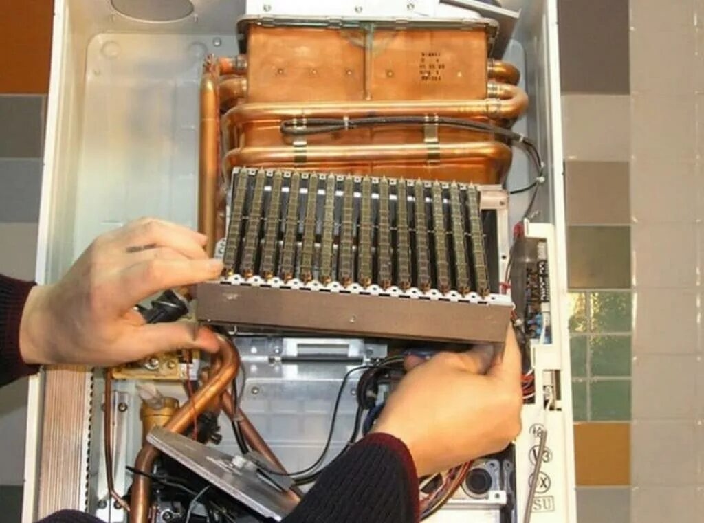 Как прочистить теплообменник. Теплообменник для газового котла. чистка теплообменника газового котла. промывка теплообменника газовой колонки. чистка теплообменника газовой колонки.