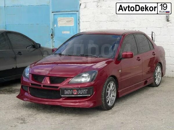 Бампер mitsubishi lancer 9. Mitsubishi Lancer 9 обвес EVO. Бампер Лансер 9 Эво. Lancer 9 бампер EVO. Mitsubishi Lancer 9 обвесы EVO Style.