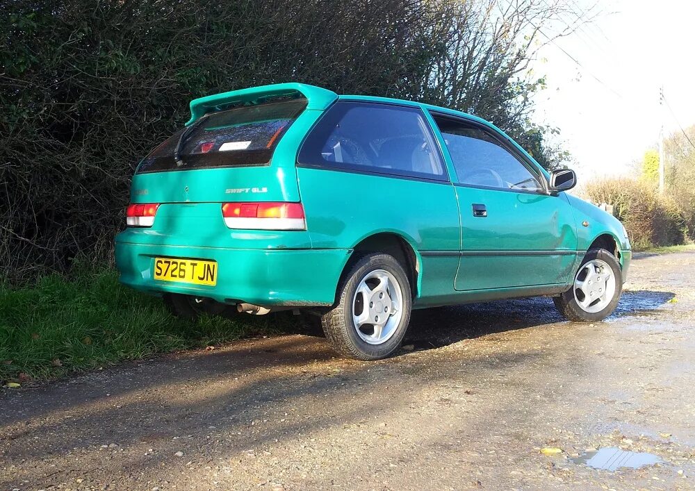 Swift 1.0. Suzuki swift 1998. suzuki swift 2 1998. сузуки свифт 1998 года. сузуки свифт 1995.