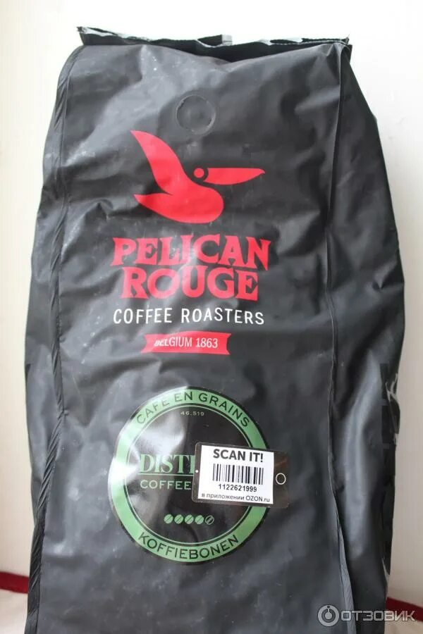 Озон кофе 1 кг. Кофе в зернах Pelican rouge distinto. Кофе в вакуумной упаковке. Кофейные зерна Пеликан. Кофе в зернах Evaristo.