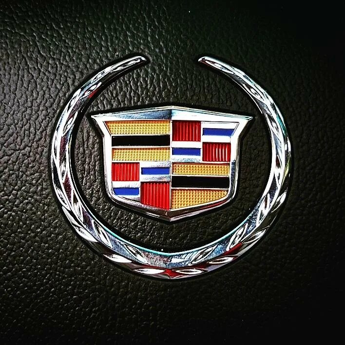 Значок машины флаги. Знак кадиллак эскалейд. кадиллак эскалейд машина марка. cadillac значок кадиллака. кадиллак эскалейд знак машины.