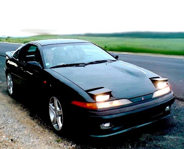 Mitsubishi 1993. Mitsubishi Eclipse 1993. Mitsubishi Eclipse 1 1993. Митсубиси Эклипс 1993. Mitsubishi Eclipse 1993 года.