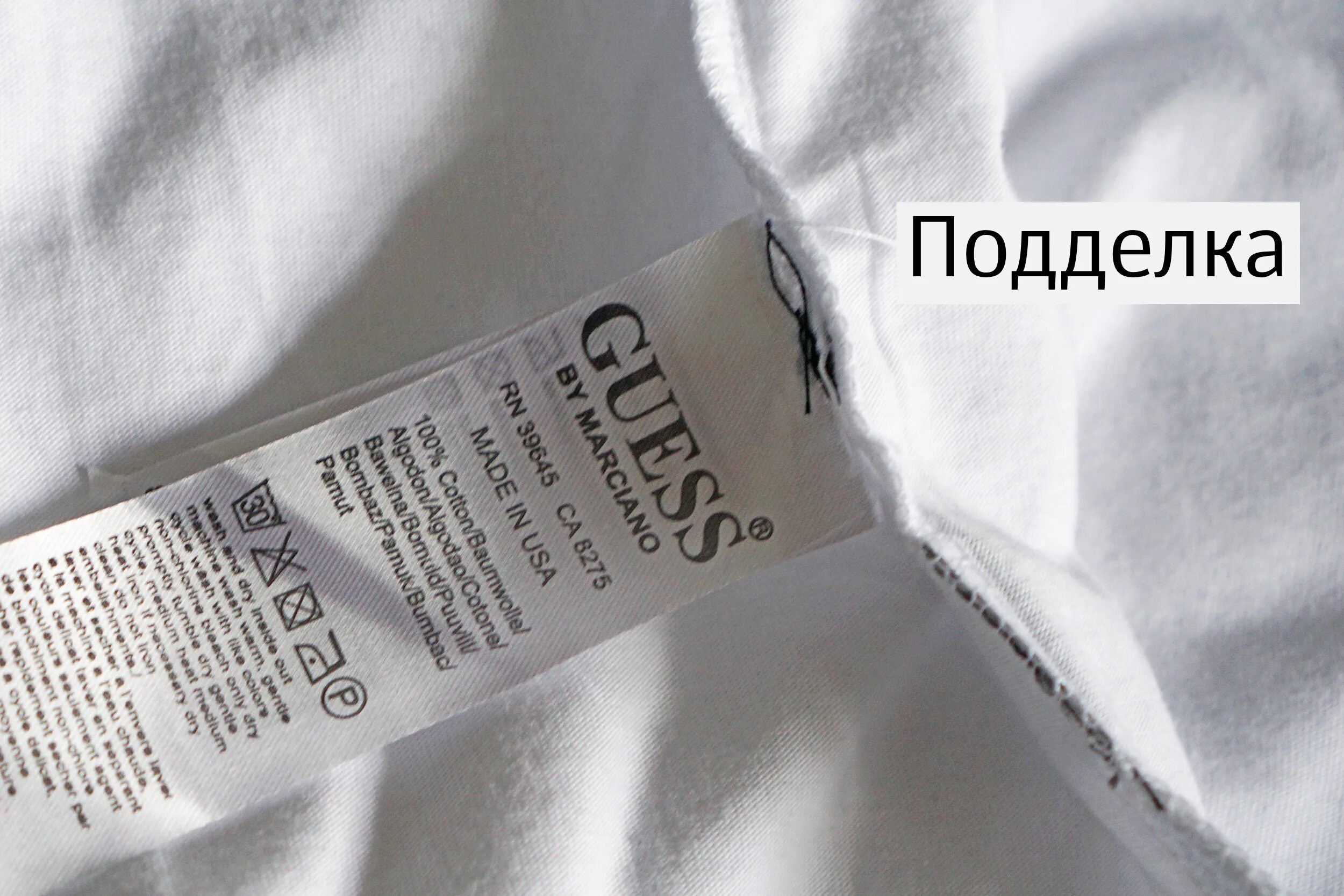 Как проверить guess на оригинальность. Бирка guess оригинал сумка. guess сумка rn62136/ca20625. оригинальная бирка guess на сумках.