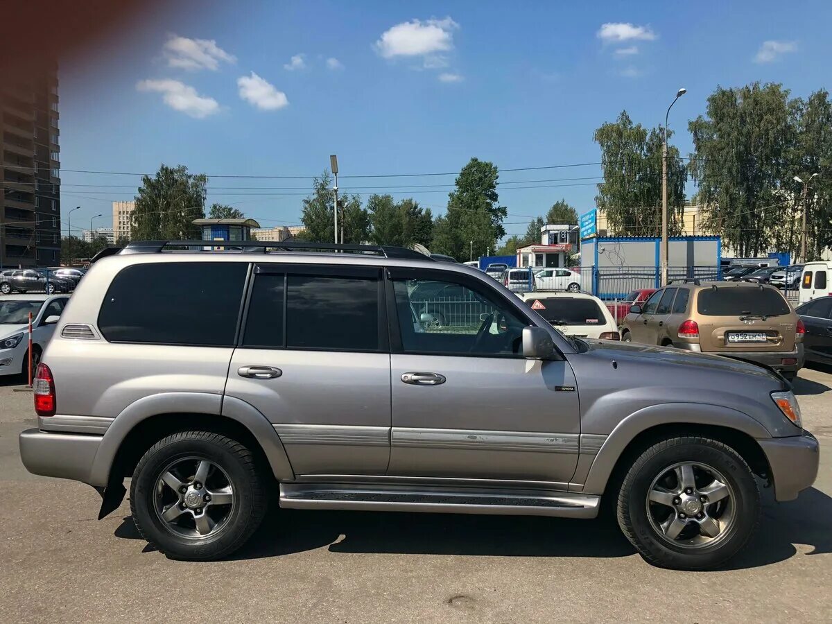 Toyota land cruiser 100 рестайлинг 2. 1998 toyota land cruiser j100. серебристый лэнд крузер 100 номер о386. Toyota land cruiser 2006. ленд крузер 100 спб.