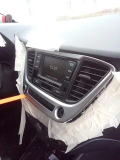 Как снять магнитолу солярис