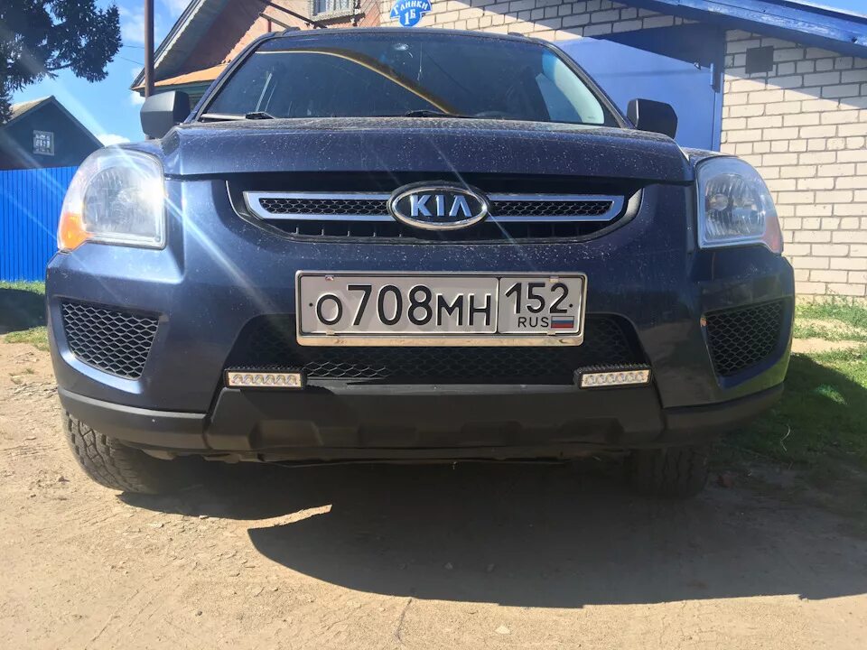 Kia Sportage 2 ходовые огни. Дневные ходовые на Киа Спортейдж 2. ДХО для Kia Sportage 2. Дневные ходовые огни на Киа Спортейдж 2.