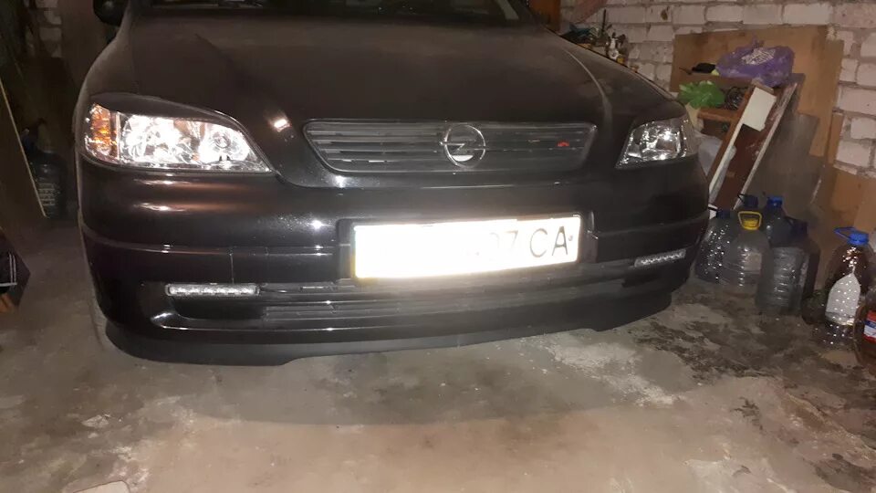 Дхо плюс. Astra g ДХО. Opel Astra g ДХО В фару.