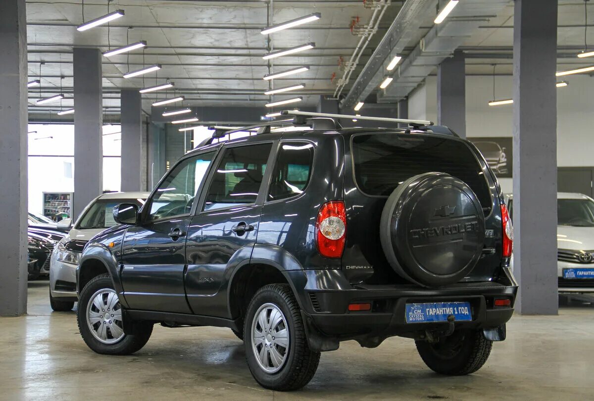 Chevrolet Niva 2011. Chevrolet Niva черная 2011. Нива Шевроле 2006. Шевроле Нива 2011 года. Купить ниву шевроле с завода цена