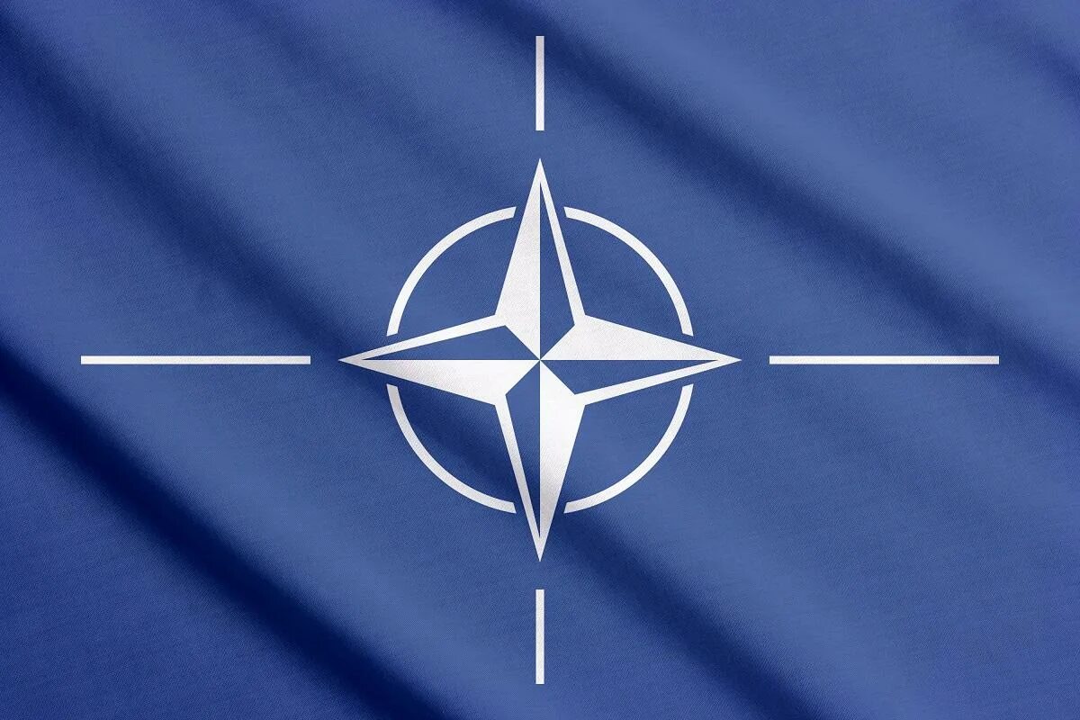 Военный блок нато создан. Флаг Североатлантического Альянса. Эмблема блока НАТО. Флаг флаг НАТО. Новый флаг НАТО.