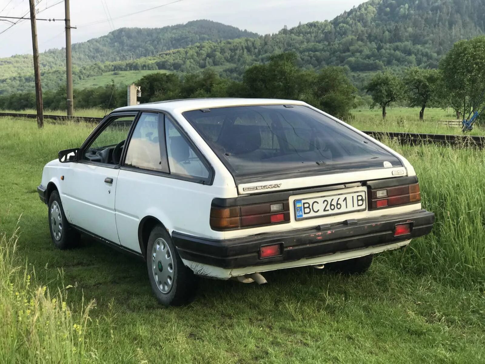 Ниссан санни годы выпуска. Nissan Sunny b11. Nissan Sunny b11 купе. Nissan Sunny b11 1988. Nissan Sunny 1985.