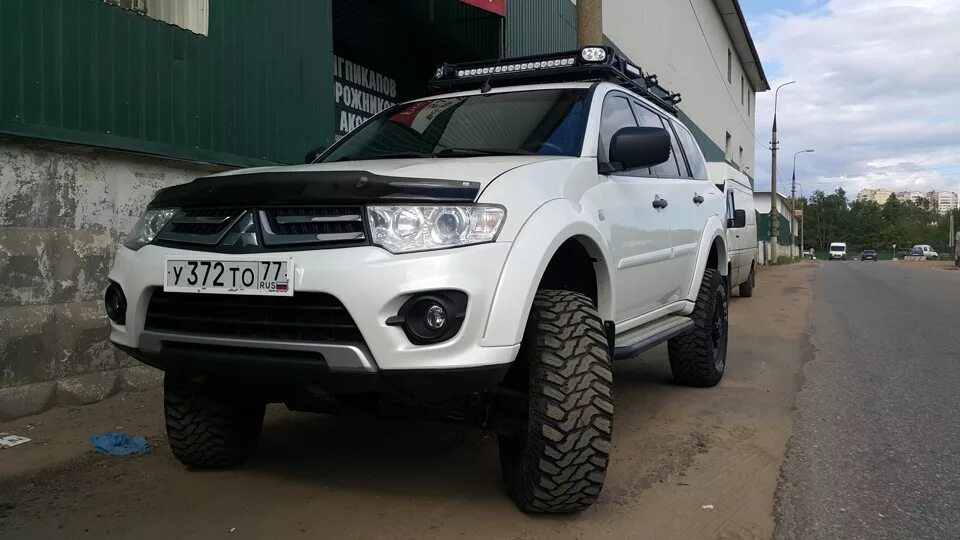 Расширители Паджеро спорт 2. Расширители арок Паджеро спорт 2. Pajero Sport 2 расширители арок. Расширители арок на Митсубиси Паджеро спорт 2. Расширители паджеро 2