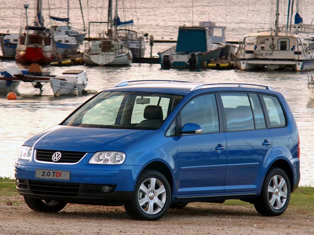 Touran 2006. Фольксваген туран 1. Volkswagen touran 2. 9. Фольксваген компактвэн туран.