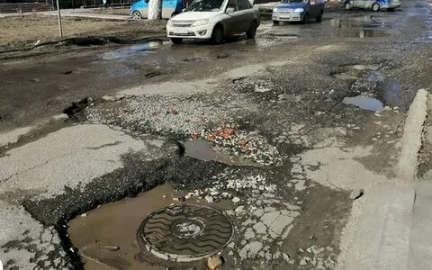 Разбитый участок дороги