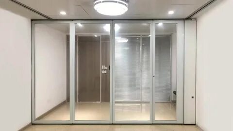 Movable glass partition system