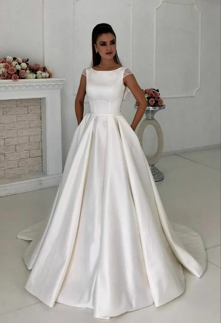 Основатель салона платьев томск ольга. Салон вечерних платьев томск. Красивые невесты россии в свадебных платьях. Фото в студии в свадебном платье с белыми орхидеями. Счастливая невеста томск свадебный салон.