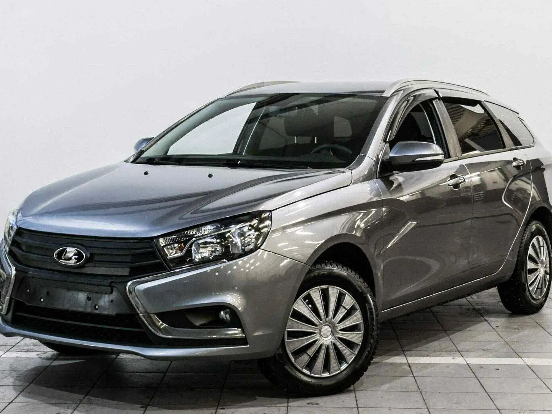 Купить б/у Lada (ВАЗ) Vesta I 1.6 MT (106 л.с.) бензин механика в Москве: белый 