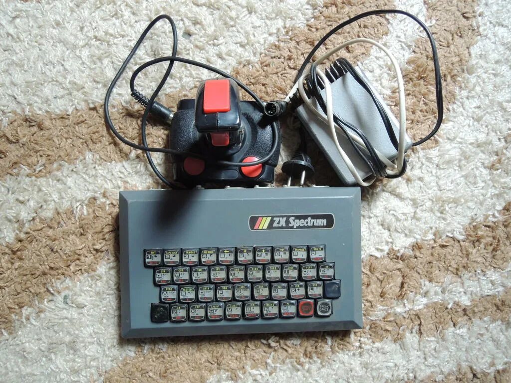 Приставка ZX Spectrum. ZX Спектрум игровая приставка. Игровая приставка Спектрум 90. Спектрум приставка на аудиокассетах. Спектрум 7 класс