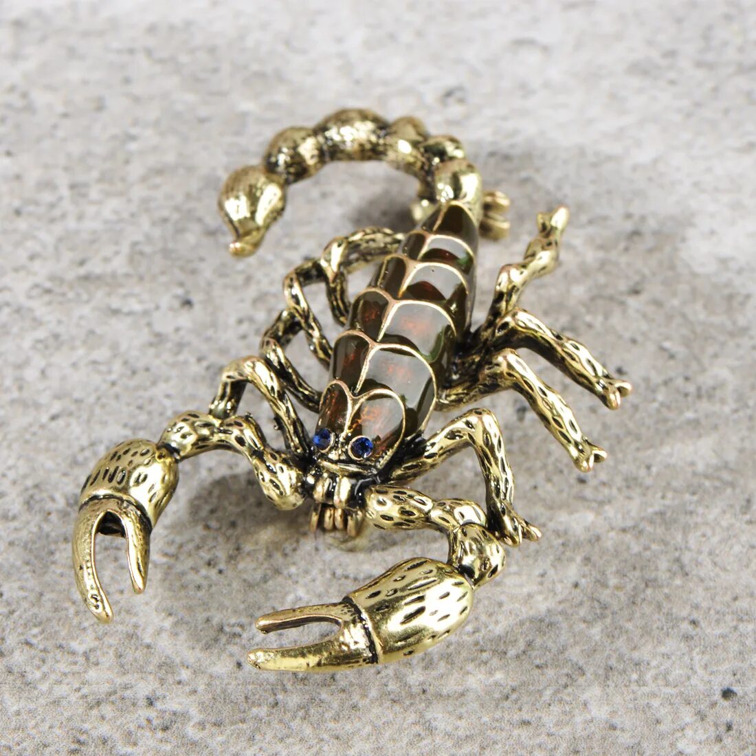 Купить золотого скорпиона