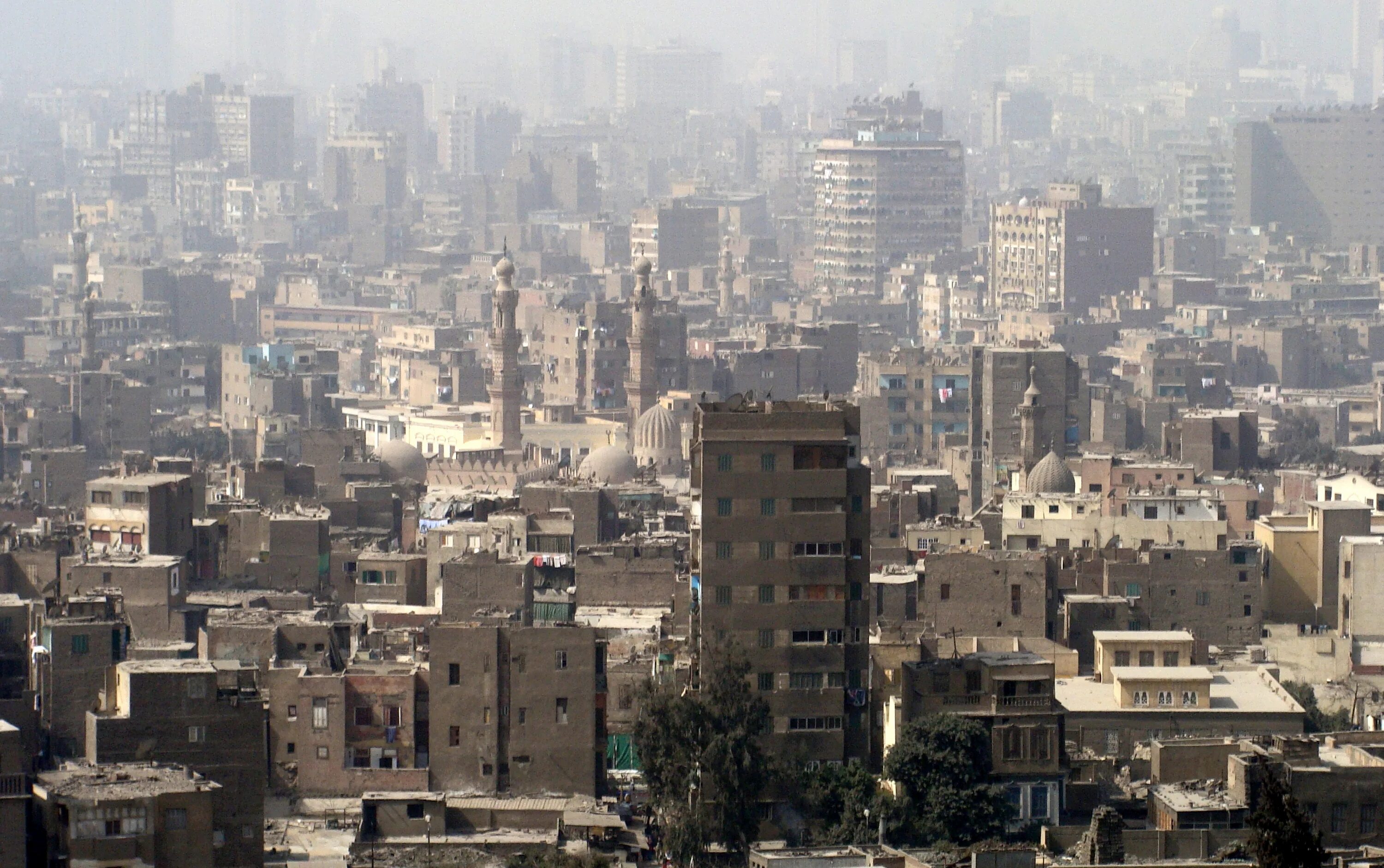 Часть большого каира 4 буквы. Город al-Qahirah. 2008 Год Каир. Каир в 21 веке. Дождь в Каире.