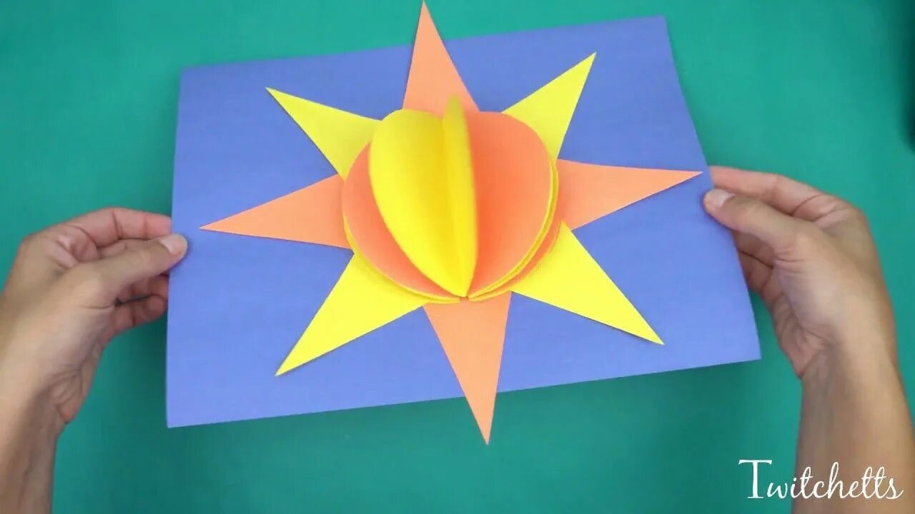 Оригами солнышко. Оригами солнце. Поделка солнце оригами. Оригами солнце из бумаги для детей.