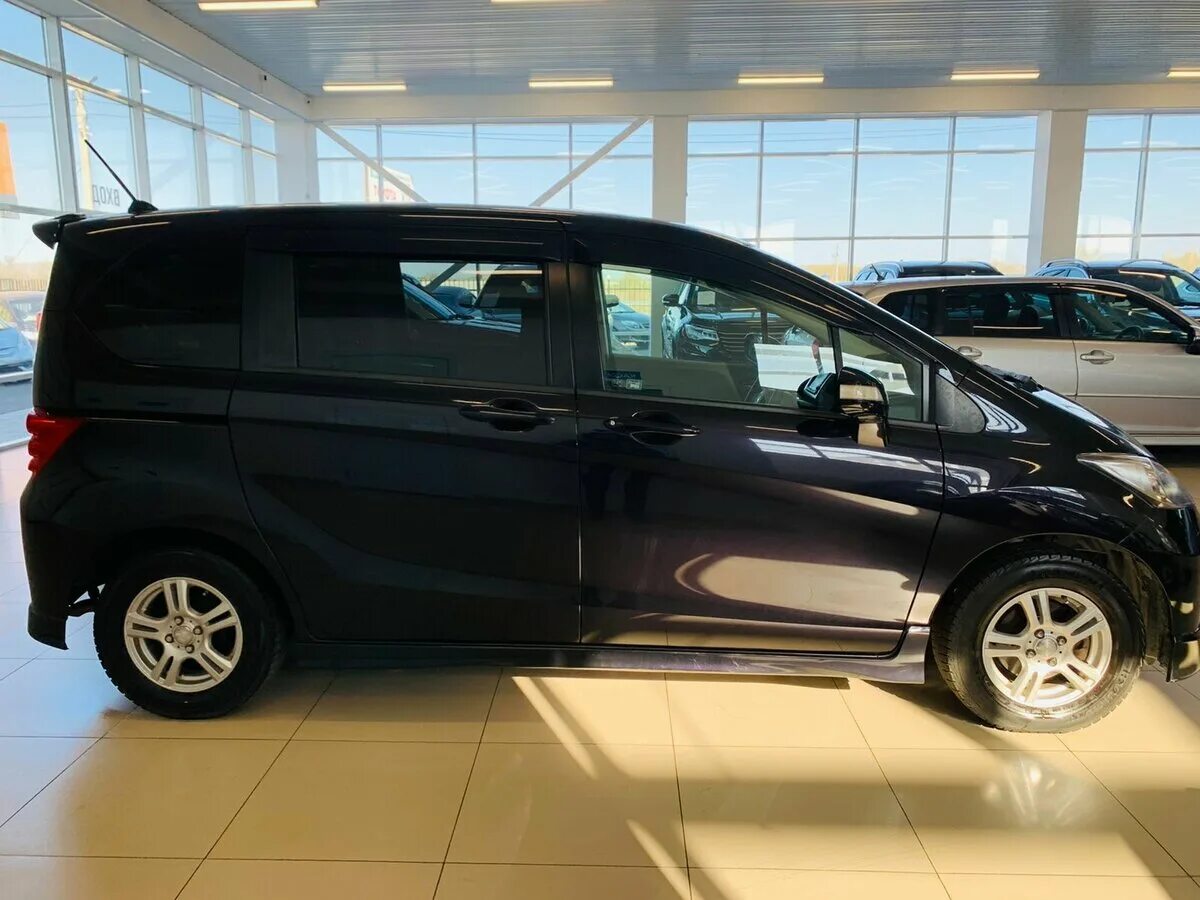 Хонда фрид 2015 года. Honda freed 2009. Honda freed черная. Honda freed черный 205. Honda freed черный 2005.