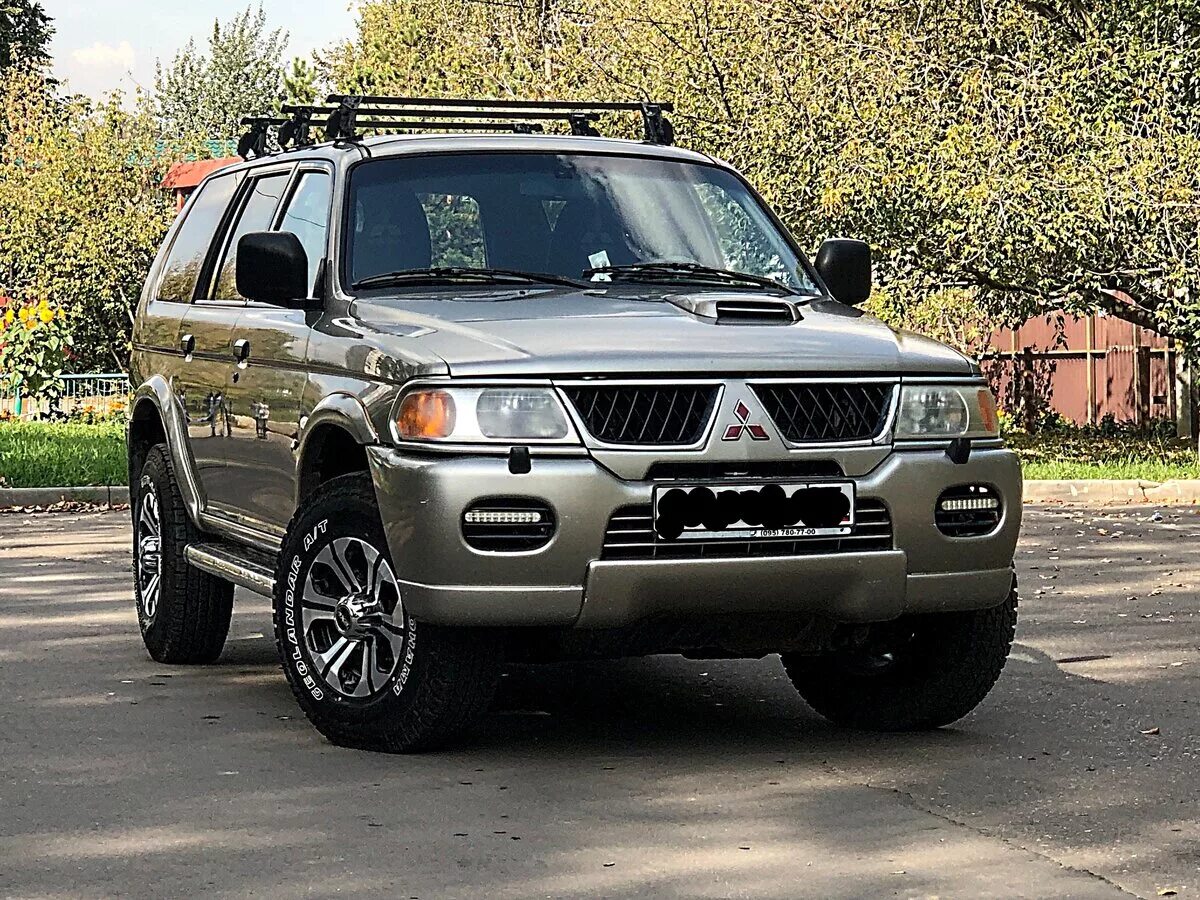 Pajero sport 2006. Mitsubishi Pajero Sport 2006. Mitsubishi Pajero Sport 1. Митсубиши Паджеро спорт 1. Мицубиси Паджеро спорт 1 поколения.