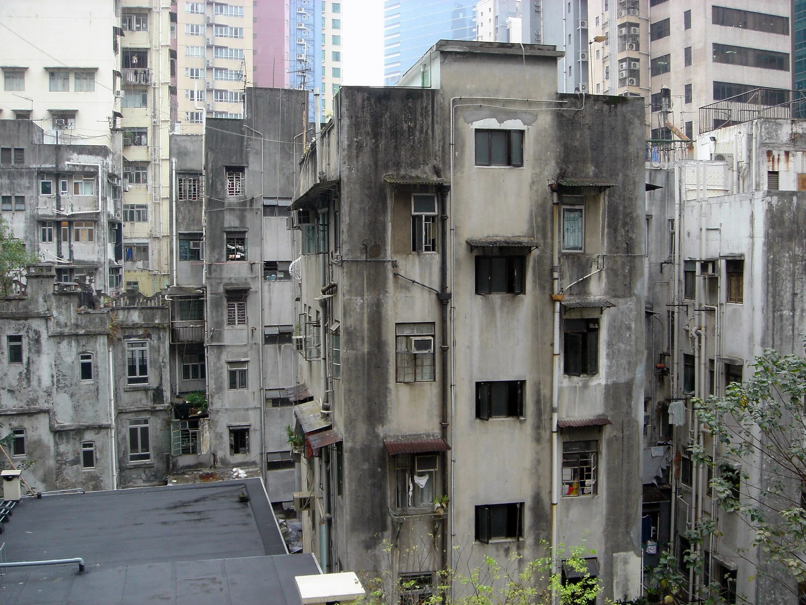 Run down area. Run-down building. гонконг здание с дырой. rundown area. run down city.