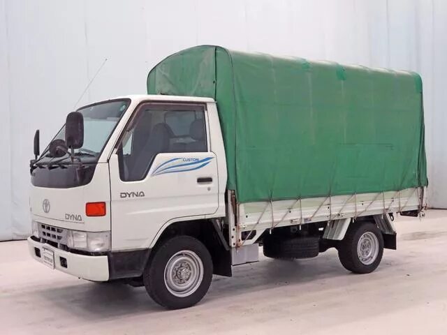 Toyota Dyna бортовой 1998. Toyota Dyna 1997. Митсубиси Кантер 1998 бортовой. Митсубиси Кантер грузовой бортовой 1994. Мицубиси бортовой