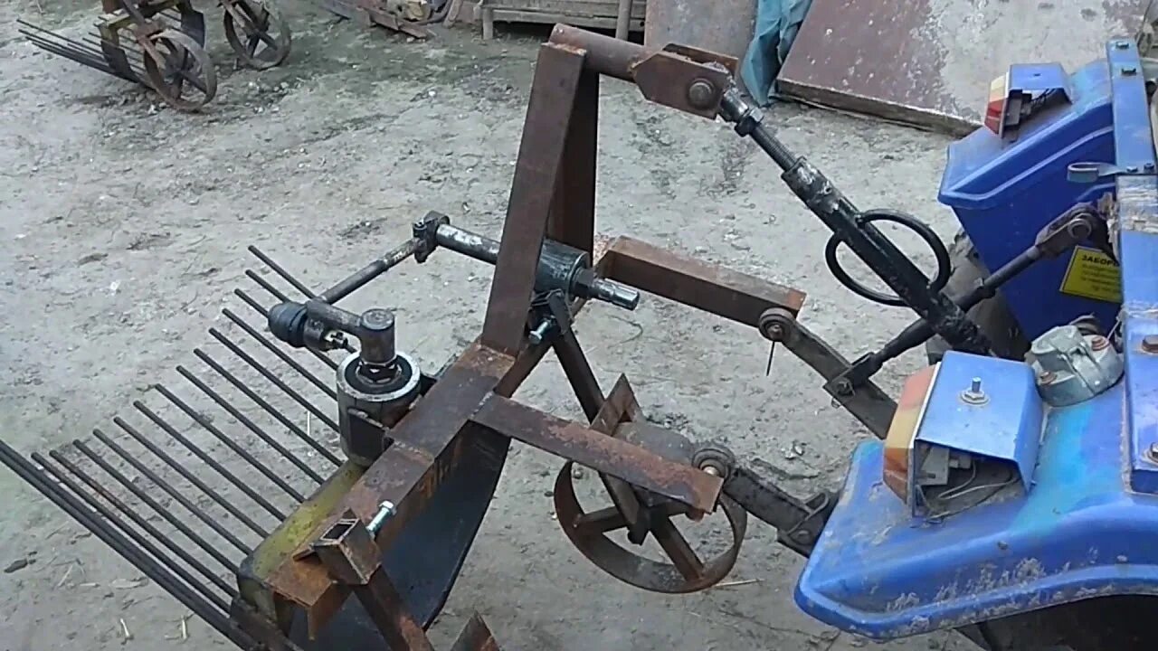 Копалка утиный. Картофелекопалка вибролапа на т-40. картофелекопалка вибролапа. картофелекопалка на т 25 вибролапа.