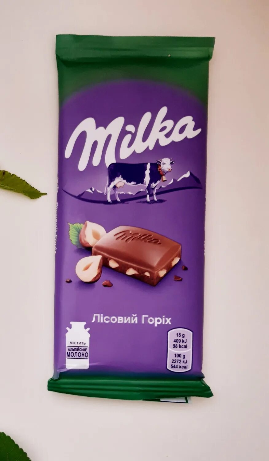 Милка с орешками. Milka шоколад молочный с дробленым орехом 85г. Шоколад милка с орехами. Милка с орешками. Милка шоколадная плитка 100гр с дробленым.