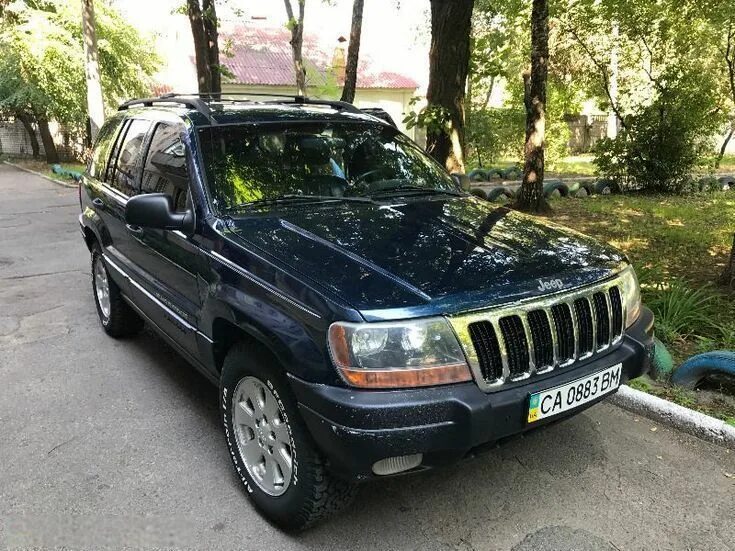 Джип гранд чероки 2001 2 год. Jeep grand cherokee 2001. Гранд чероки wj 2. Jeep cherokee 2001. Автомобиль jeep grand cherokee.