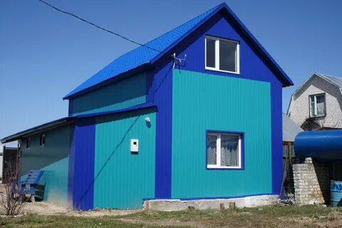 Отделка фасада дома профлистом
