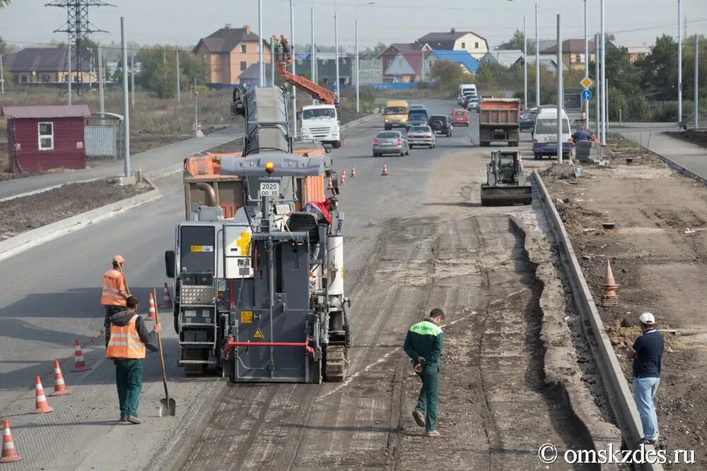 Фото отремонтированных дорог омск. Дорога ремонт. Строительство дорог омск. В омске начался ремонт дорог. Ремонт дорог омск.