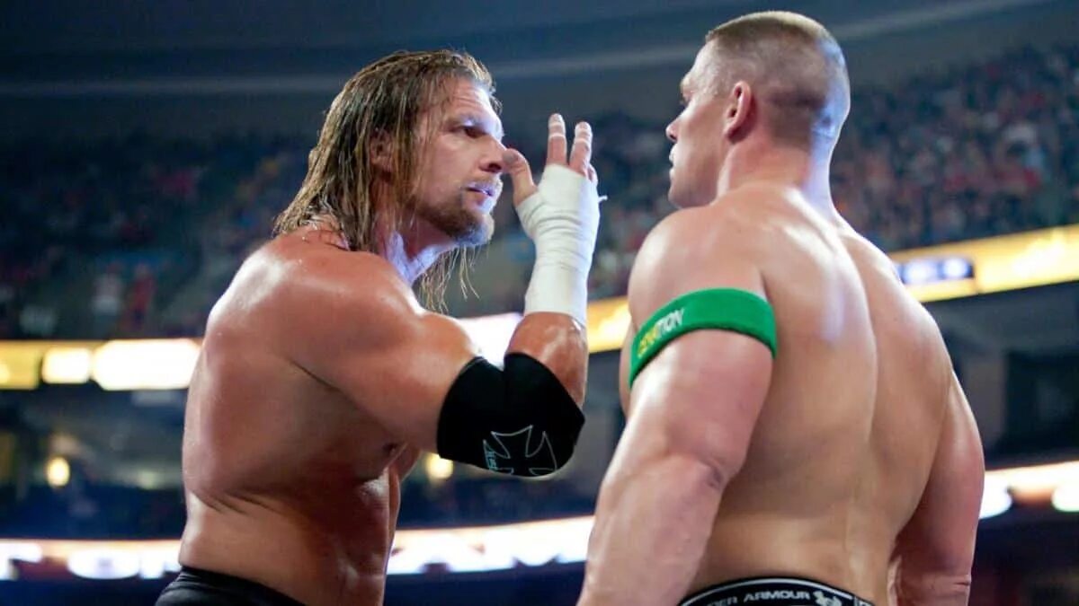 Что значит трипл. Трипл эйч и джон сина. triple h 2002. triple h 2025. трипл эйч против.