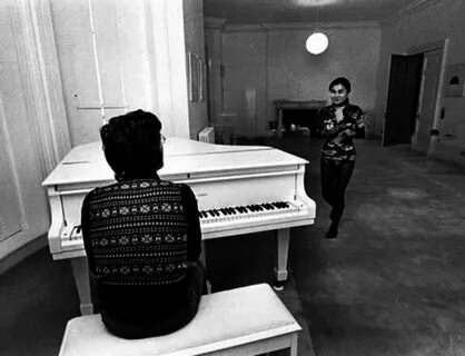 John playing the piano