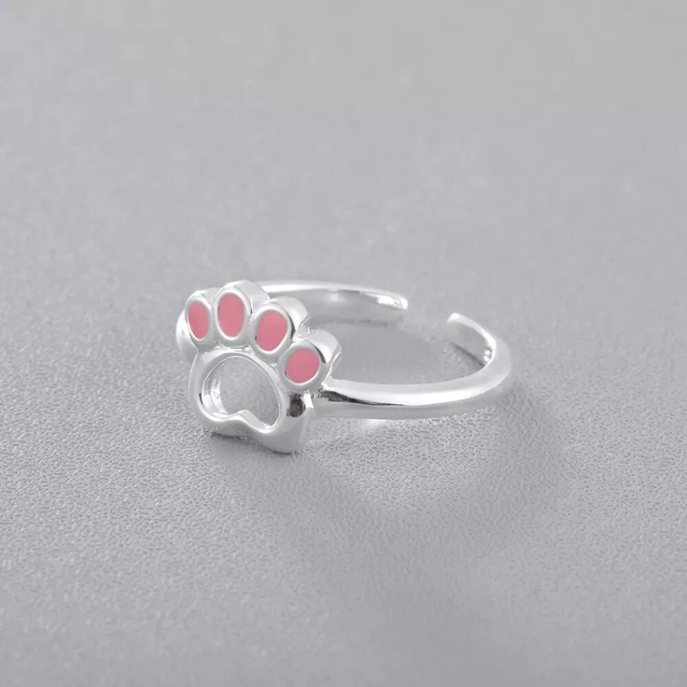 Кольцо кошачья лапка золото. Кольцо с лапкой. Кольцо с лапкой. Серебряное кольцо с лапками. Кольцо лапка собаки.