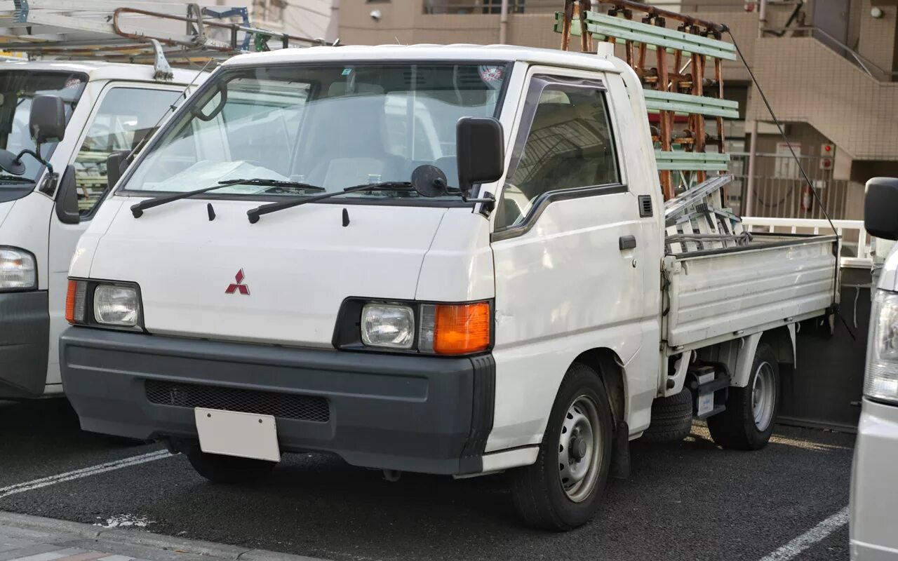 Митсубиси l300 Truck. Mitsubishi l300 бортовой. Митсубиси л300 грузовой. Mitsubishi l300 Делика. Мицубиси бортовой