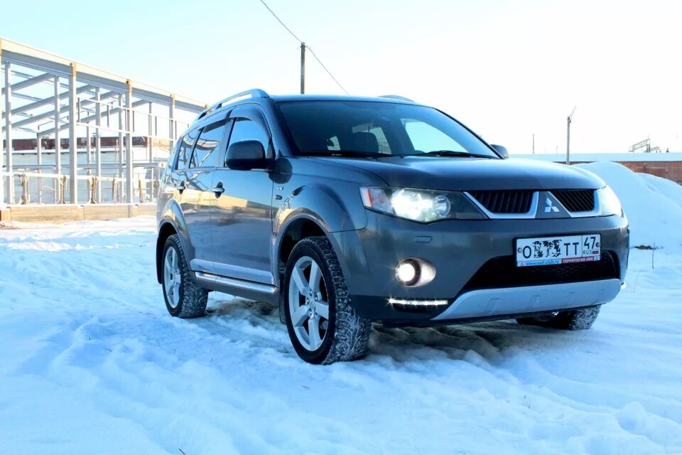 Mitsubishi Outlander XL 2008. Митсубиси Аутлендер XL 3.0 2008. Аутлендер XL 3.0 серебро. Мицубиси Аутлендер 2008 зима.