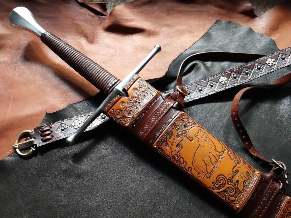 Ножны меча 14 век. Меч в ножнах. Кожаные ножны для меча. Средневековые ножны.
