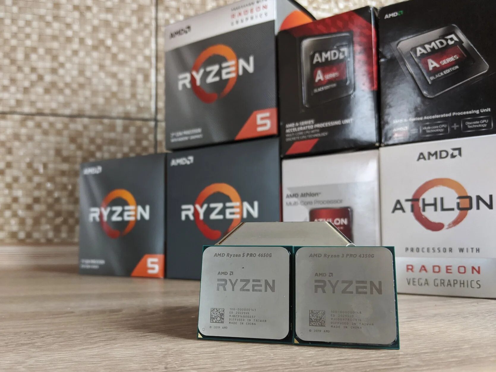 Amd radeon graphics ryzen 5. Процессор AMD Ryzen 3 Pro 4350g. Процессор AMD Ryzen 7 5700g. AMD Ryzen 5 Pro 4650g. Процессор AMD Ryzen 7 5700g упаковка.