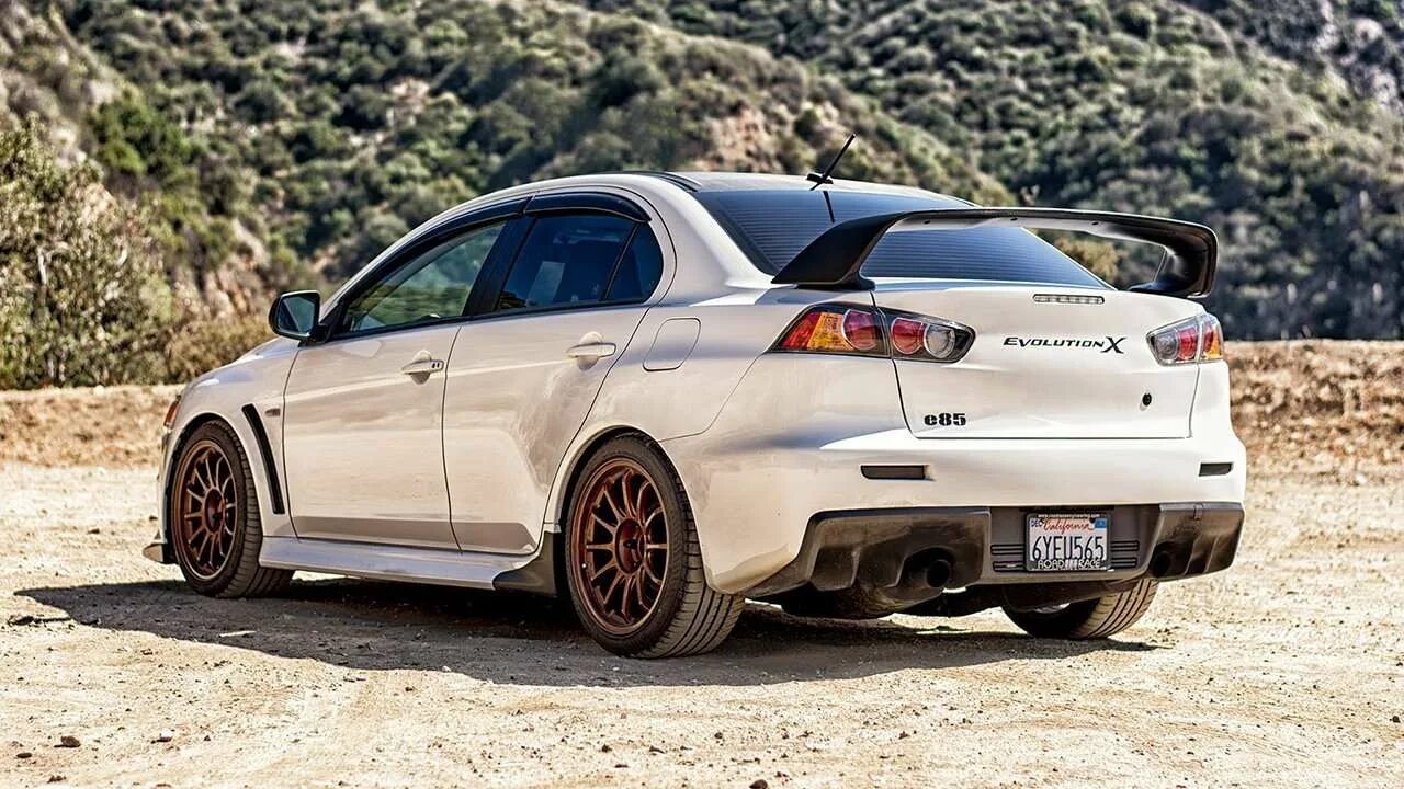 Mitsubishi evo x. Лансер 10 Эволюшн. Митсубиши ланцер 10 Эво. Митсубиши Лансер эко 10. Lancer EVO X 10.