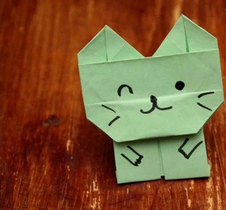 Оригами котик. Оригами кошка. Кот из бумаги видео. Оригами котик из бумаги. Классные поделки из бумаги.