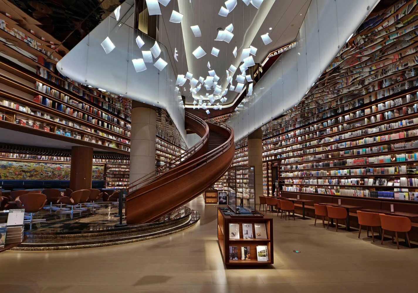 Где библиотека. Книжный магазин Дуцзянъянь. Огромная современная библиотека. Интерьер современного книгохранилища библиотеки. Интерьер книжного магазина.
