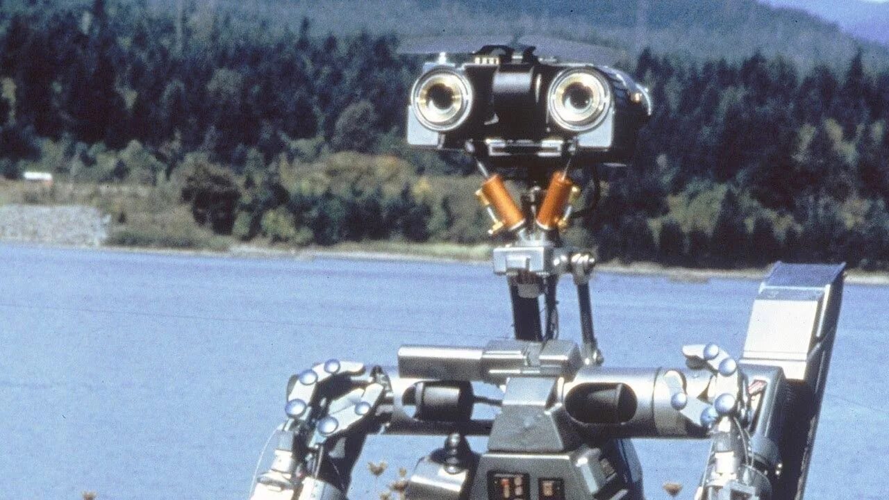 1 был робот номер 1. Джонни 5 короткое замыкание. short circuit johnny 5 робот. робот джонни короткое замыкание 1986. джонни 5 короткое замыкание 2.