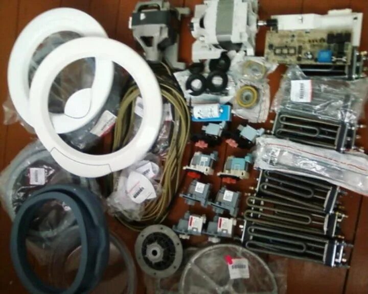 Магазин запчастей для стиральной машинки. Запчасти для стиральных машин. запчасти для стиральных машин автомат. склад запчастей для стиральных машин.