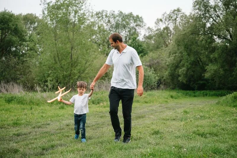 Father and son Play with Water Guns.